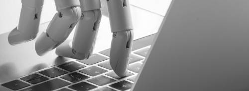 Chatbot , artificial intelligence , robo advisor , robotic concept. Robot finger point to laptop button.
